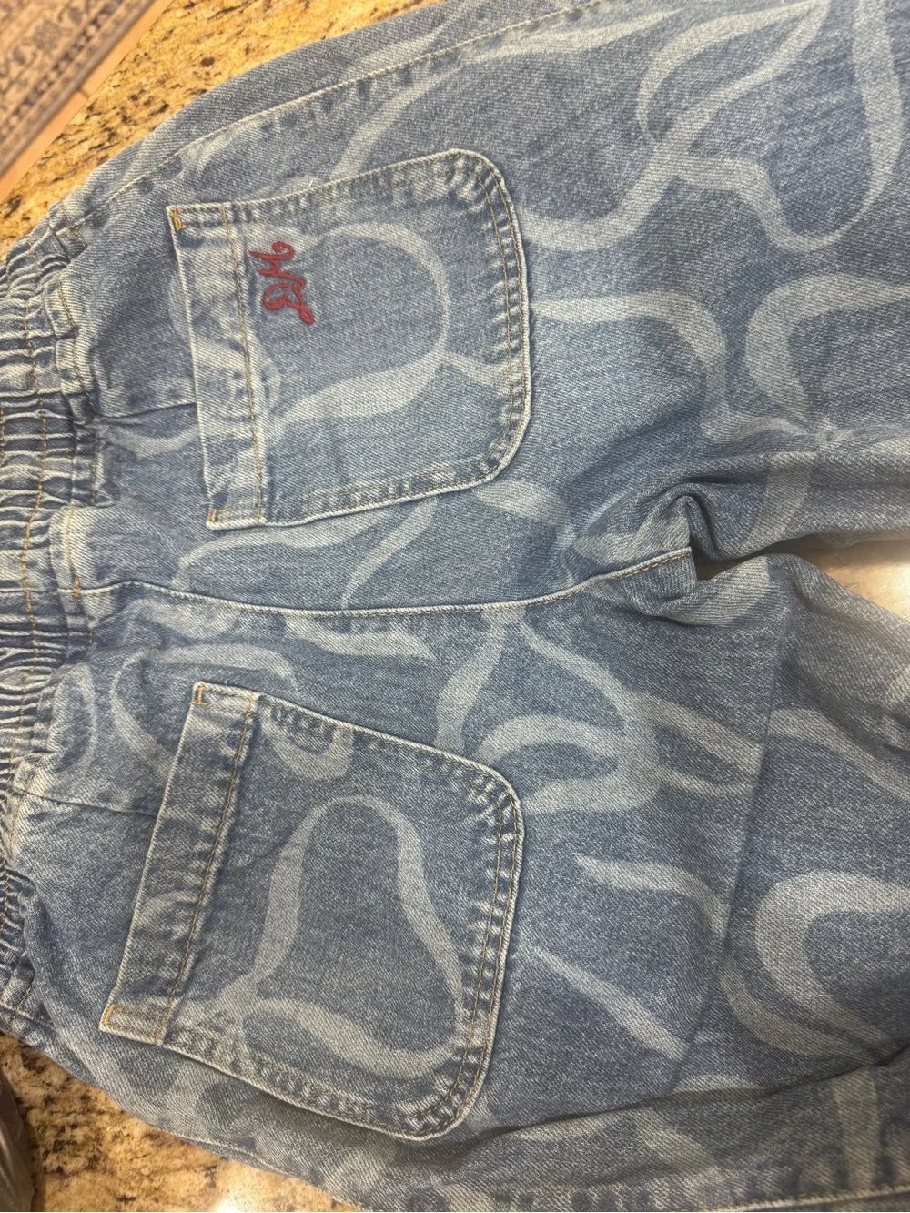 Damson Madder Light Blue Denim barrel jeans with bow print